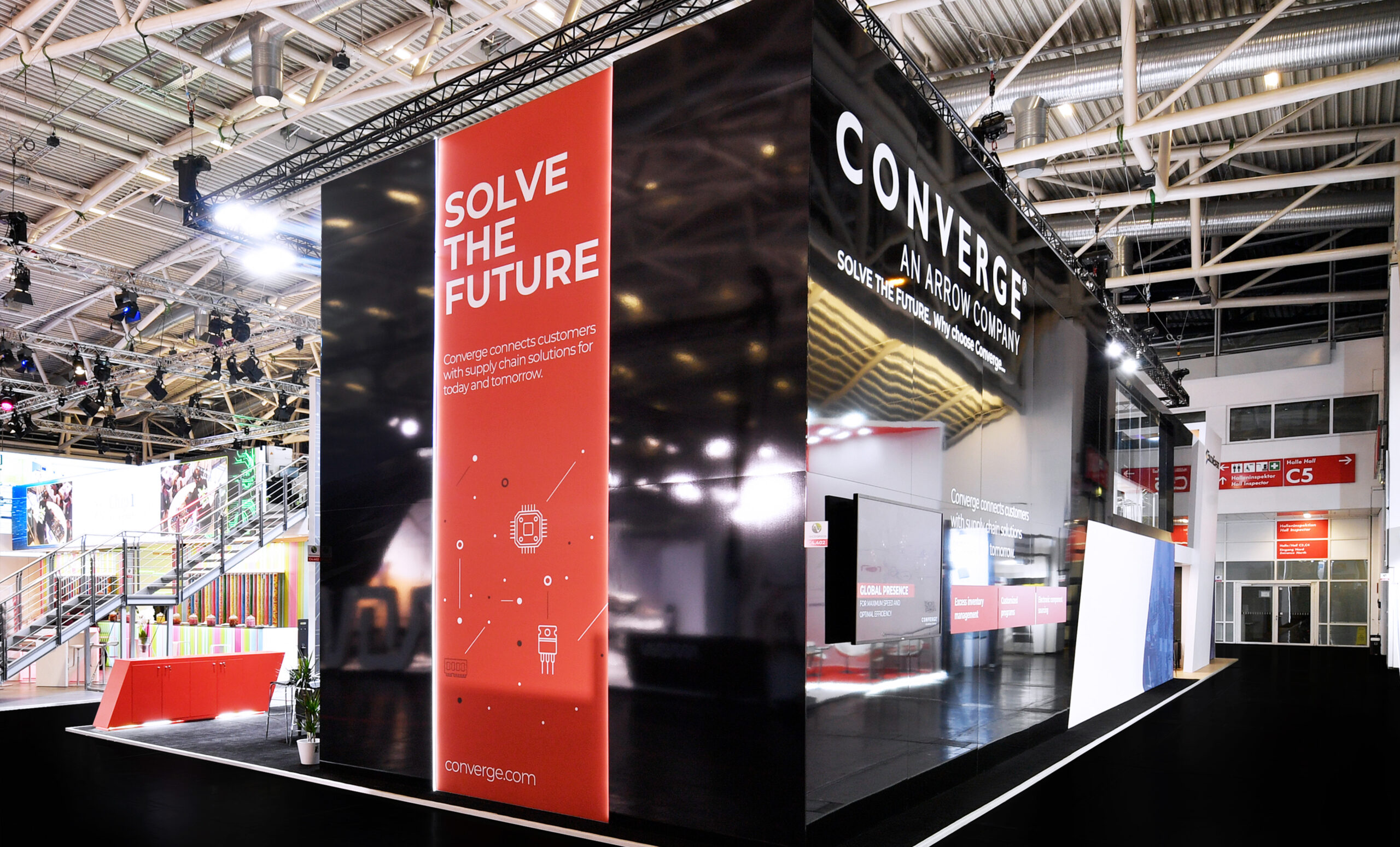 Solve the Future branding at Converge trade show exhibit display with modern architecture