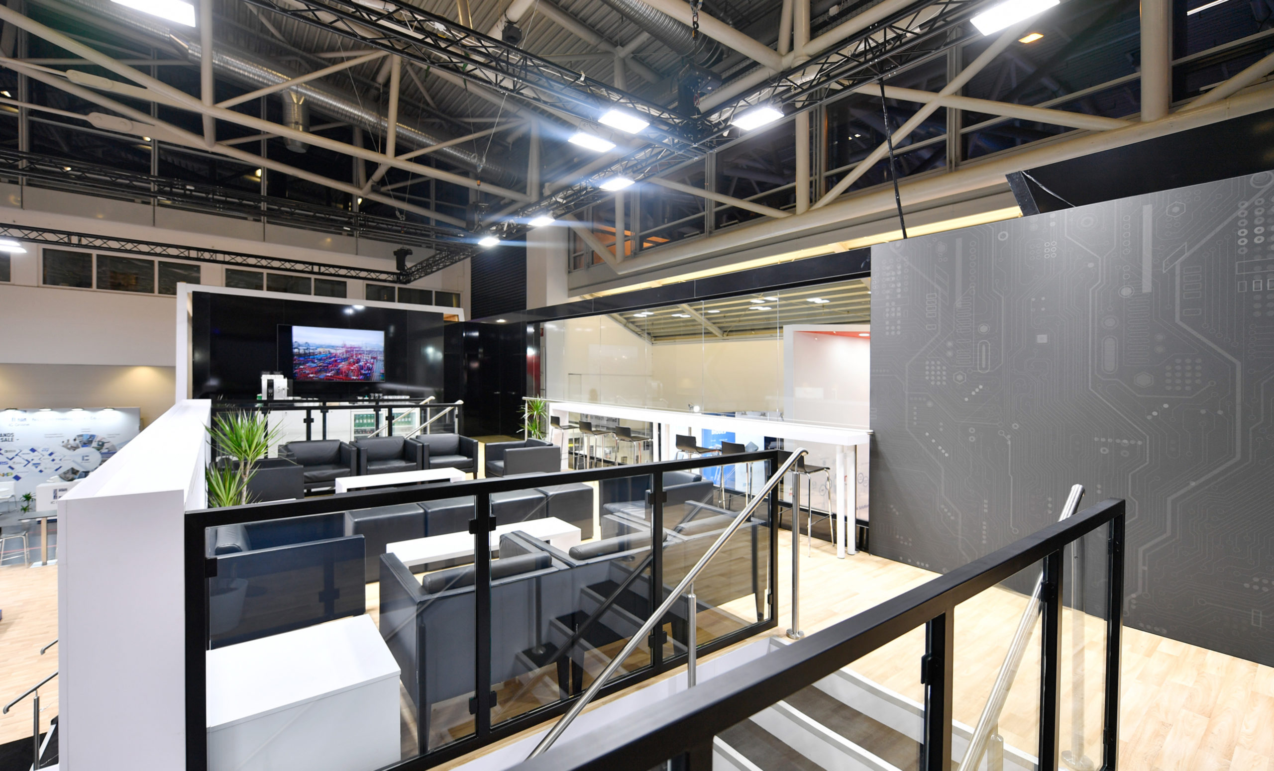 Second level seating area inside Converge custom trade show exhibit display