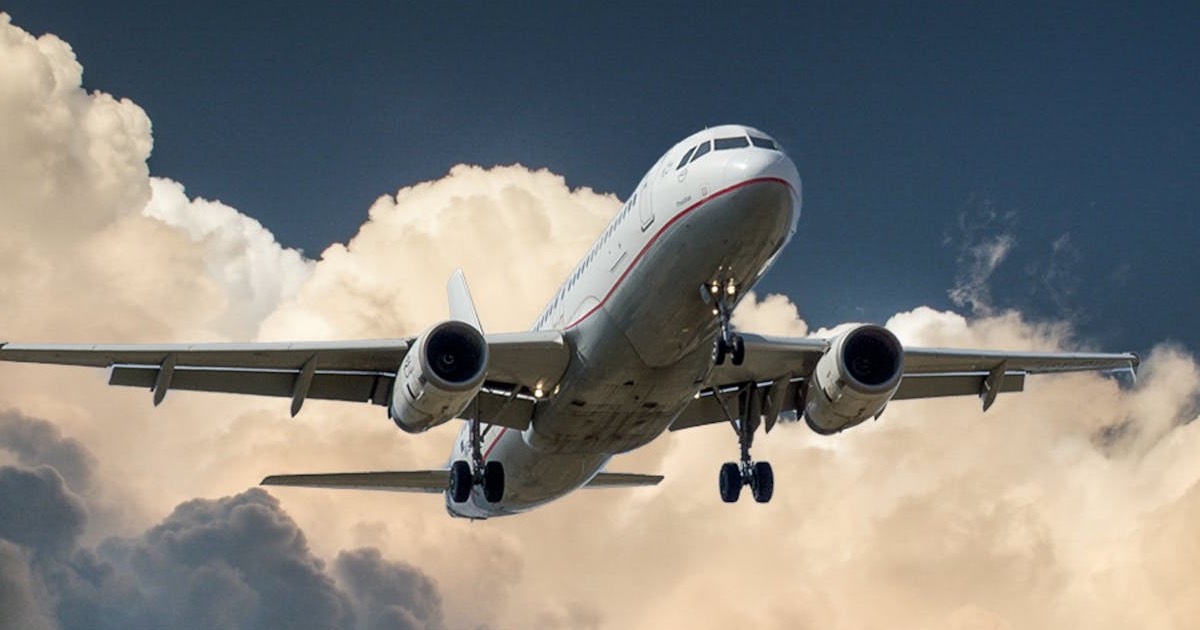 Airplane traveling to a trade show event
