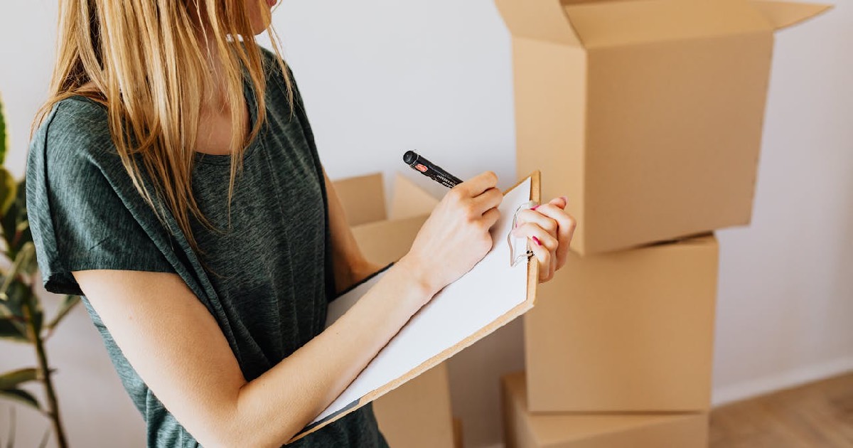 Woman checking off a list